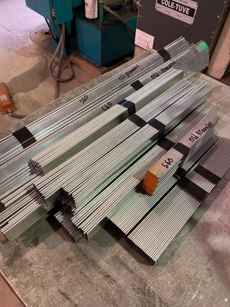 The shop runs the S and Drive from 3.65” wide strips (Flat S) and 2.125” wide Strips ( Drive Cleat) precut to the length of the dimension for which it will be installed. It’s then bundled and taped to the duct on which it will be installed at the jobsite.