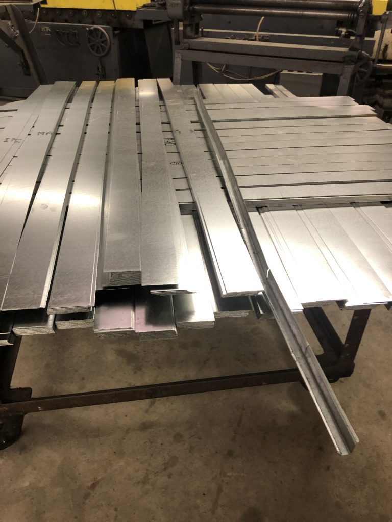 The common Drive dimensions are 4” thru 14” even sizes and the Flat S ones are 8” thru 24” even sizes. Therefore many mechanicals and sheet metal contractors will precut the Drives (2” over) and Flat S (1/2” under) 